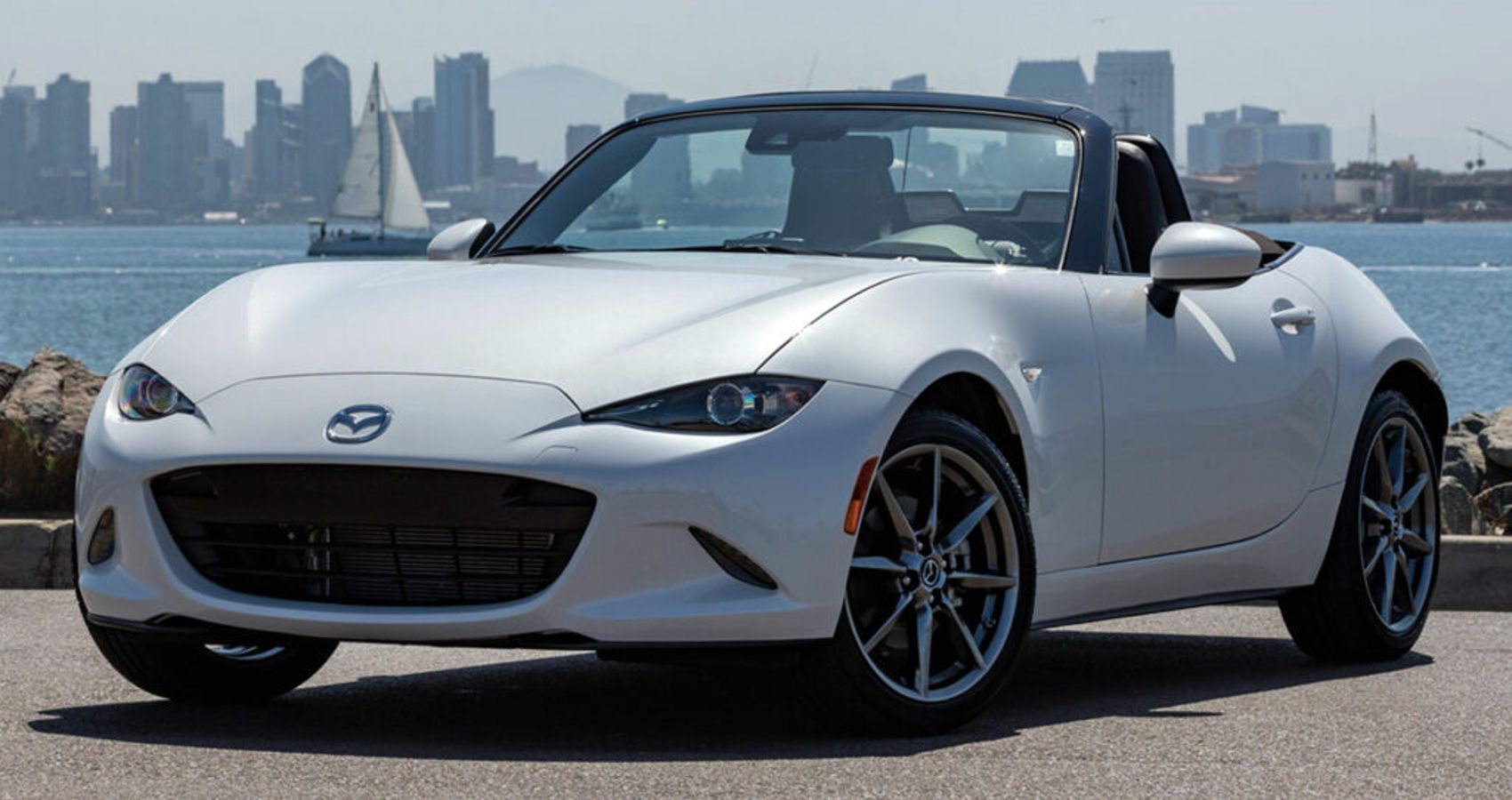 2023 Mazda MX-5 Miata-1 with water and the city skyline in the background